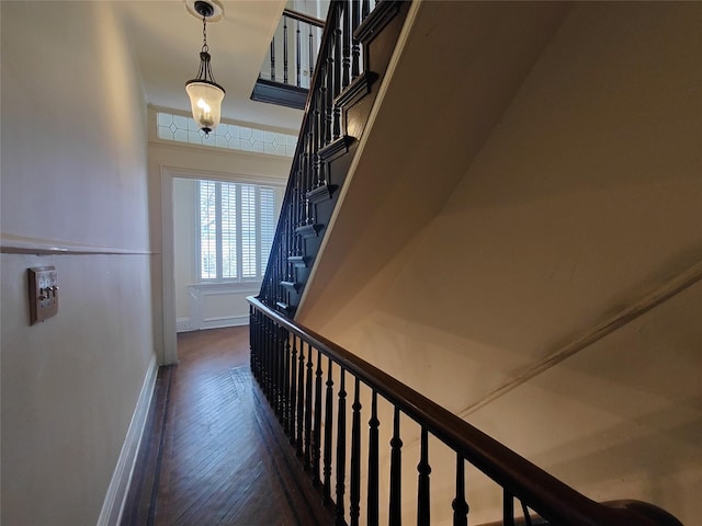 324 150th St, Whitestone, NY 11357 - hallway featuring stairway and dark wood-style flooring