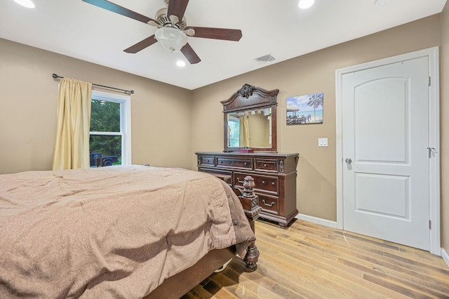 bedroom with recessed lighting, visible vents, a ceiling fan, light wood-type flooring, and baseboards