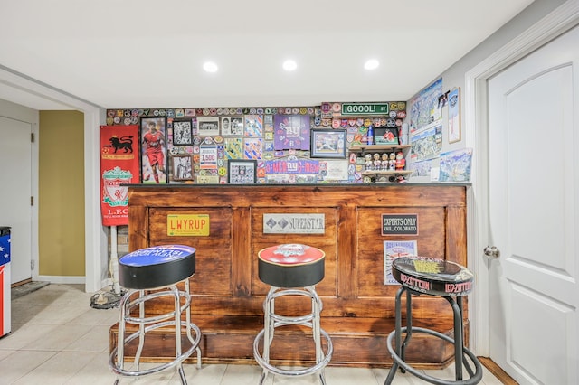 bar with recessed lighting, a dry bar, and tile patterned floors