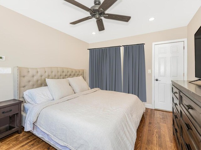 16 Joan Dr, Yonkers, NY 10704 - bedroom with dark wood finished floors, recessed lighting, ceiling fan, and baseboards