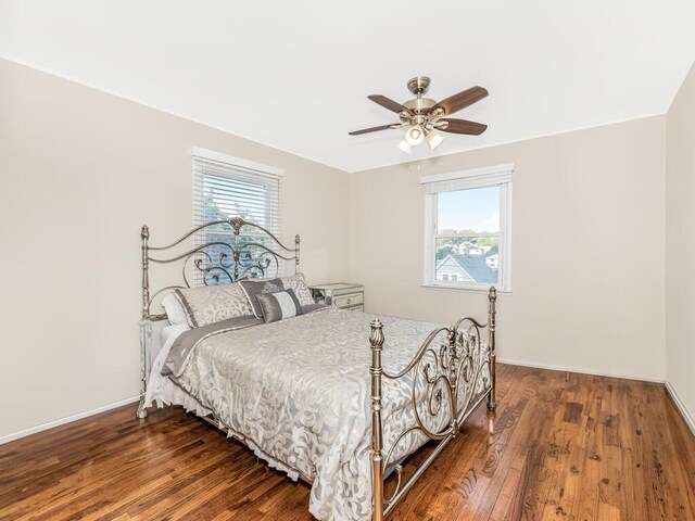 16 Joan Dr, Yonkers, NY 10704 - bedroom with wood finished floors, a ceiling fan, and baseboards