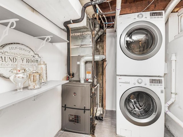 16 Joan Dr, Yonkers, NY 10704 - laundry room featuring estacked washer and dryer