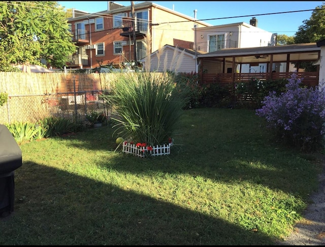 view of yard featuring fence