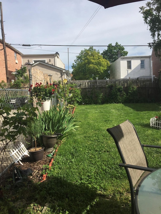 view of yard with fence