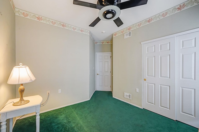 unfurnished bedroom featuring carpet, visible vents, and baseboards