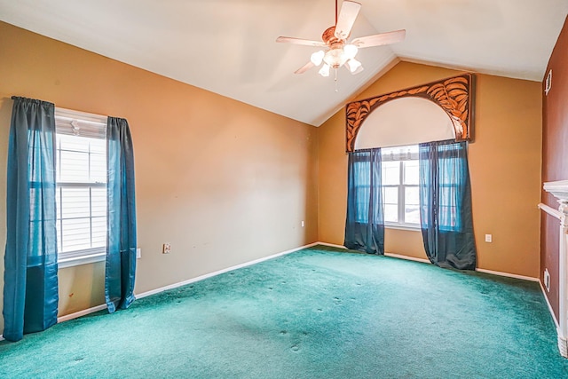 unfurnished room with carpet floors, lofted ceiling, and baseboards