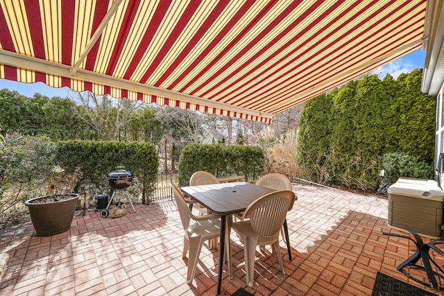 view of patio / terrace featuring outdoor dining area and area for grilling