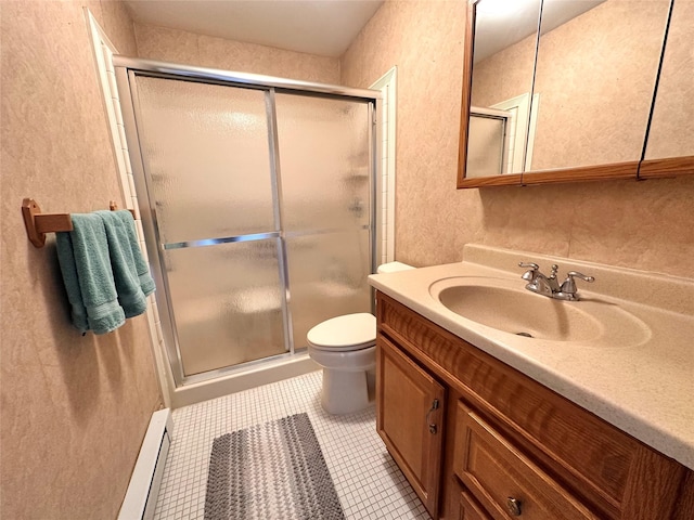 full bath with tile patterned flooring, toilet, a baseboard heating unit, vanity, and a shower stall