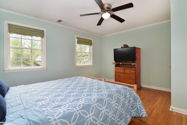6 Hazen St, Pelham, NY 10803 - bedroom with baseboards, wood finished floors, ornamental molding, and ceiling fan