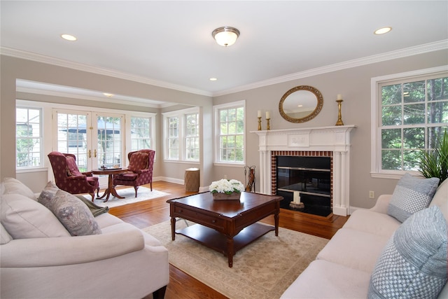 6 Hazen St, Pelham, NY 10803 - living area featuring healthy amount of natural light, wood finished floors, crown molding, and recessed lighting