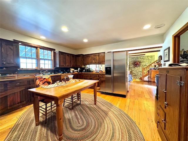 2838 Old Kings Rd, Catskill, NY 12414 - kitchen featuring stainless steel fridge, light wood-style floors, dark brown cabinets, and recessed lighting