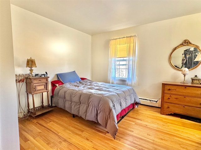 2838 Old Kings Rd, Catskill, NY 12414 - bedroom with a baseboard heating unit and light wood-style flooring