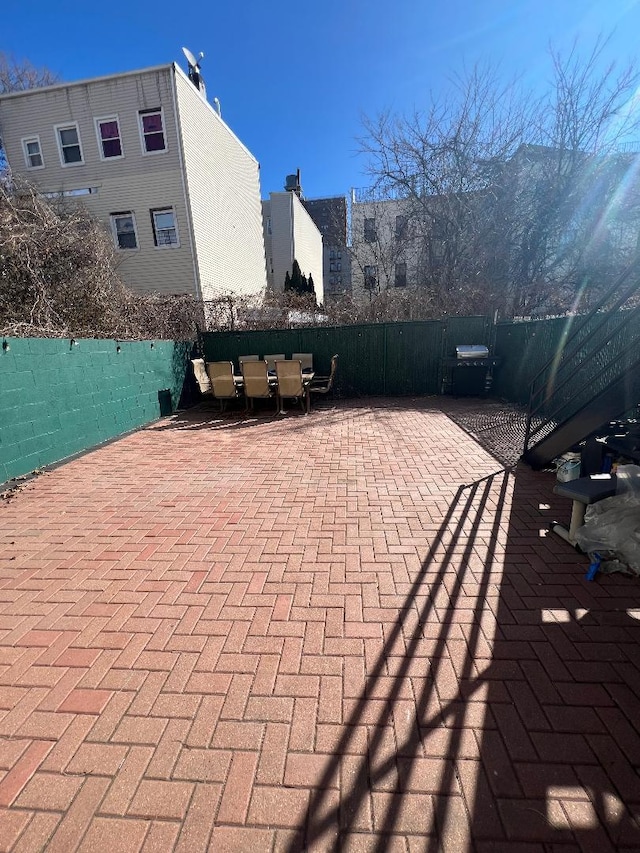 view of patio with fence