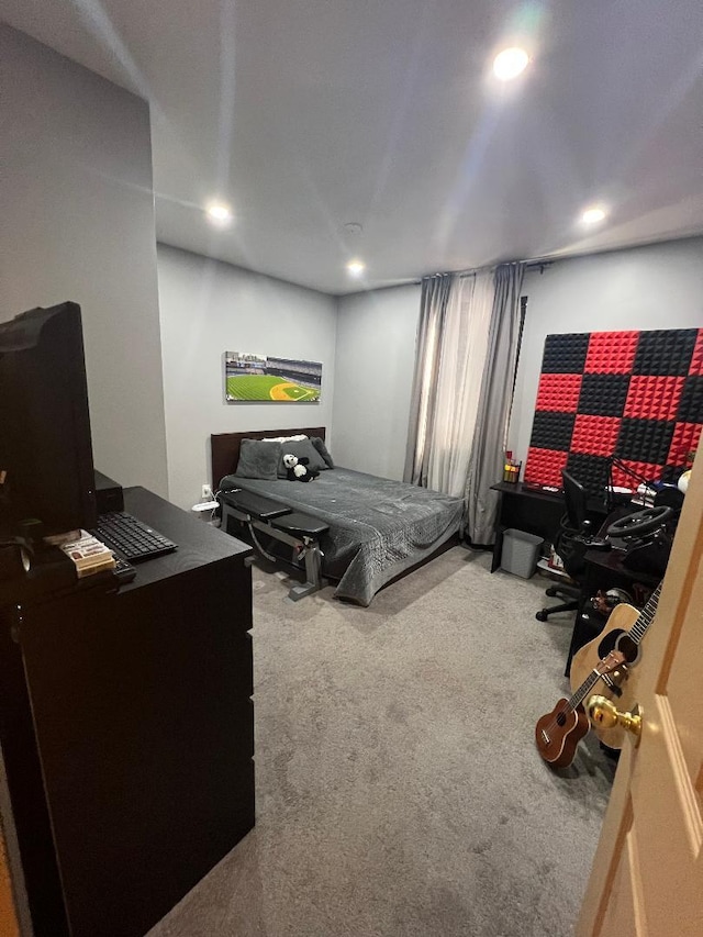 bedroom with carpet and recessed lighting