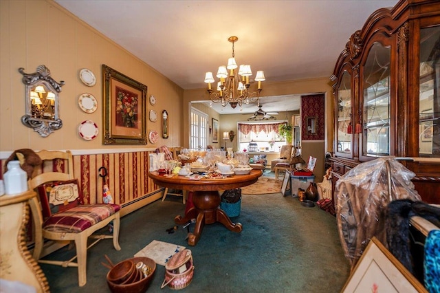 carpeted dining room featuring a notable chandelier, a baseboard heating unit, and ornamental molding