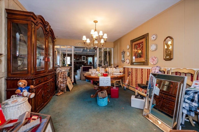 dining area with an inviting chandelier