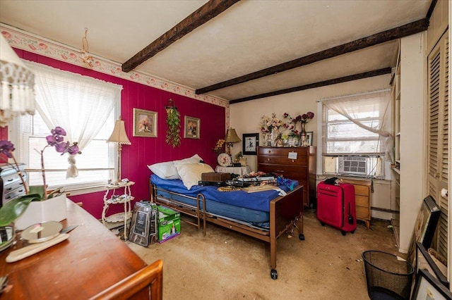 bedroom with beam ceiling, cooling unit, and a baseboard heating unit