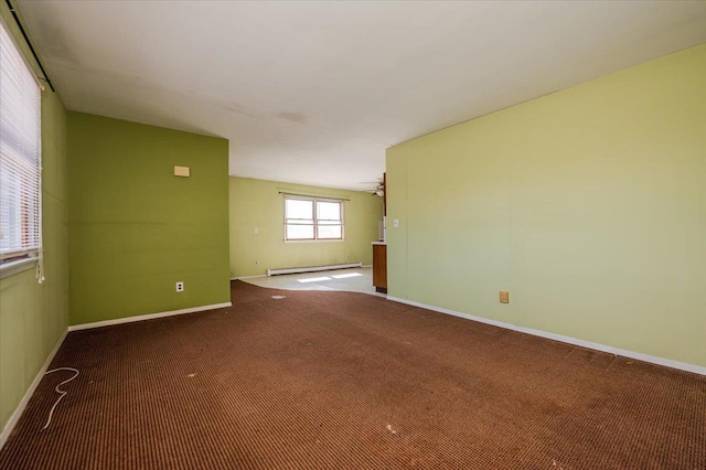 empty room with carpet, baseboards, baseboard heating, and ceiling fan