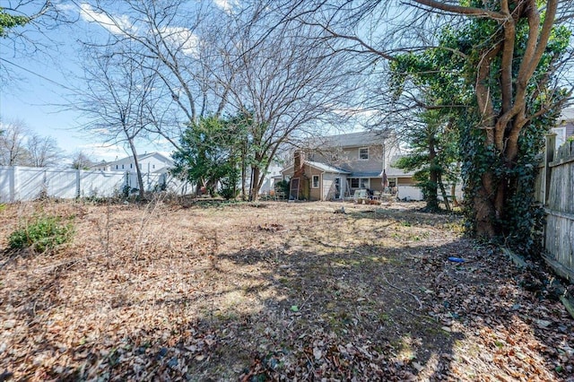 view of yard with fence