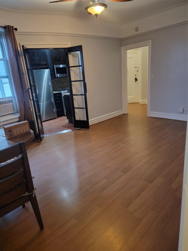 83-55 Lefferts Blvd Apt # 6F, Kew Gardens, NY 11415 - unfurnished room featuring wood finished floors and baseboards