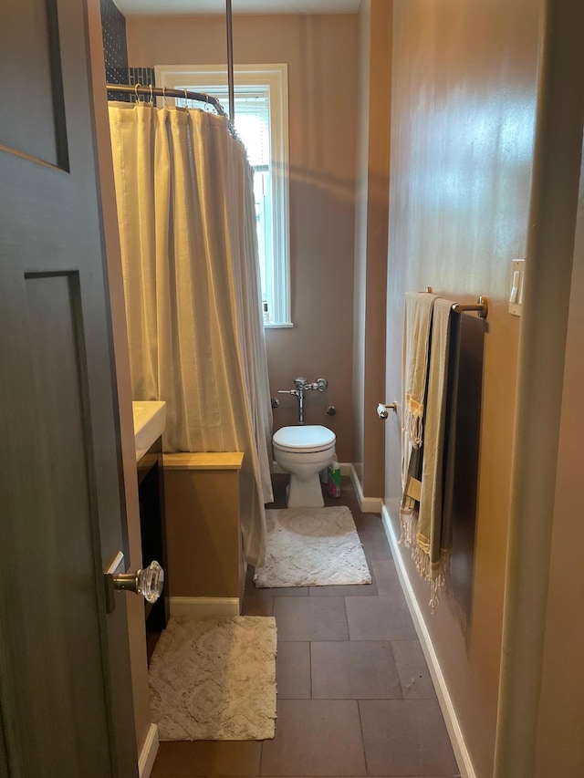 83-55 Lefferts Blvd Apt # 6F, Kew Gardens, NY 11415 - full bathroom with vanity, toilet, tile patterned floors, baseboards, and a shower with shower curtain