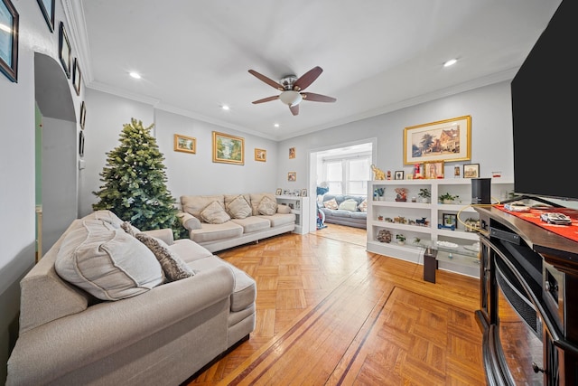 living room with ornamental molding, recessed lighting, and ceiling fan