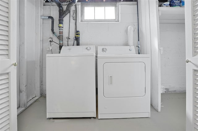 laundry area with laundry area and independent washer and dryer