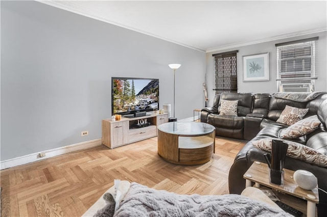 living area with baseboards and ornamental molding