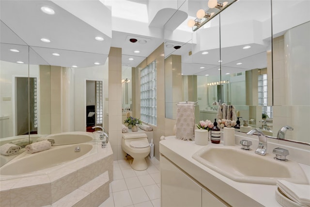 full bath featuring toilet, a bath, tile patterned flooring, vanity, and tile walls