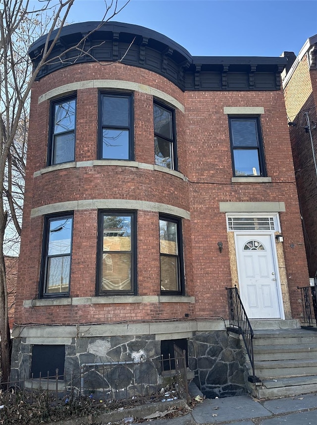 view of front of property with brick siding