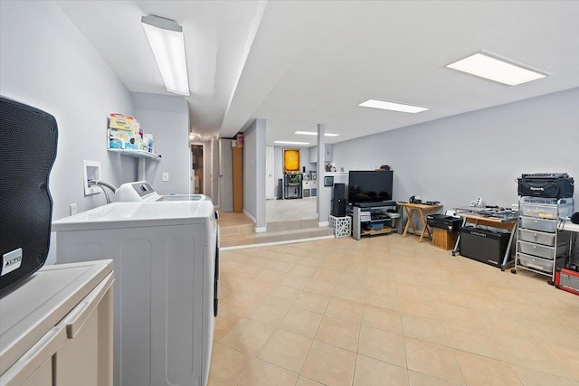 washroom with laundry area and washer and clothes dryer