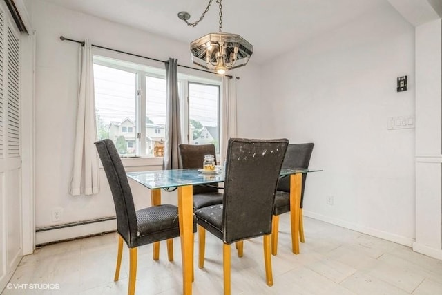 18 Old Farm Rd, Levittown, NY 11756 - dining room featuring a baseboard radiator and a chandelier