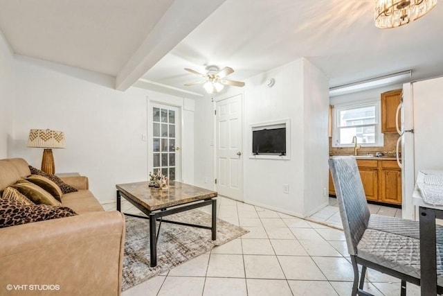 18 Old Farm Rd, Levittown, NY 11756 - living room featuring light tile patterned floors, ceiling fan, and beam ceiling