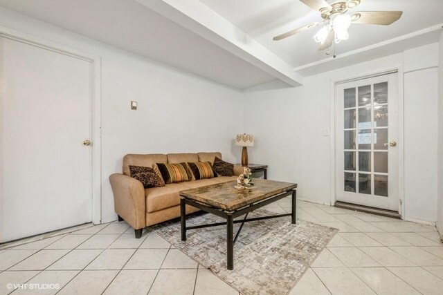 18 Old Farm Rd, Levittown, NY 11756 - living area with light tile patterned floors and ceiling fan