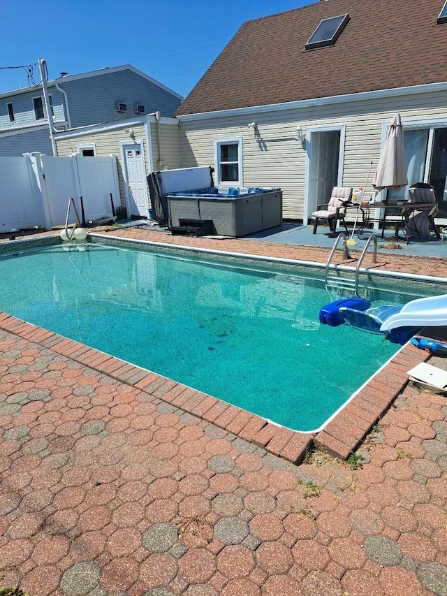 18 Old Farm Rd, Levittown, NY 11756 - view of swimming pool featuring a hot tub, a patio, and a water slide