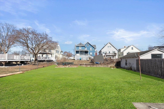 view of yard featuring fence