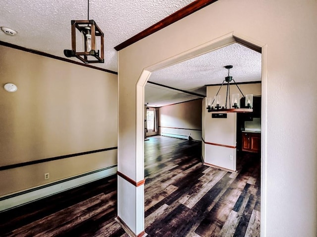 521 Hessinger Lare Rd, Jeffersonville, NY 12748 - corridor featuring a textured ceiling, crown molding, wood finished floors, arched walkways, and baseboard heating