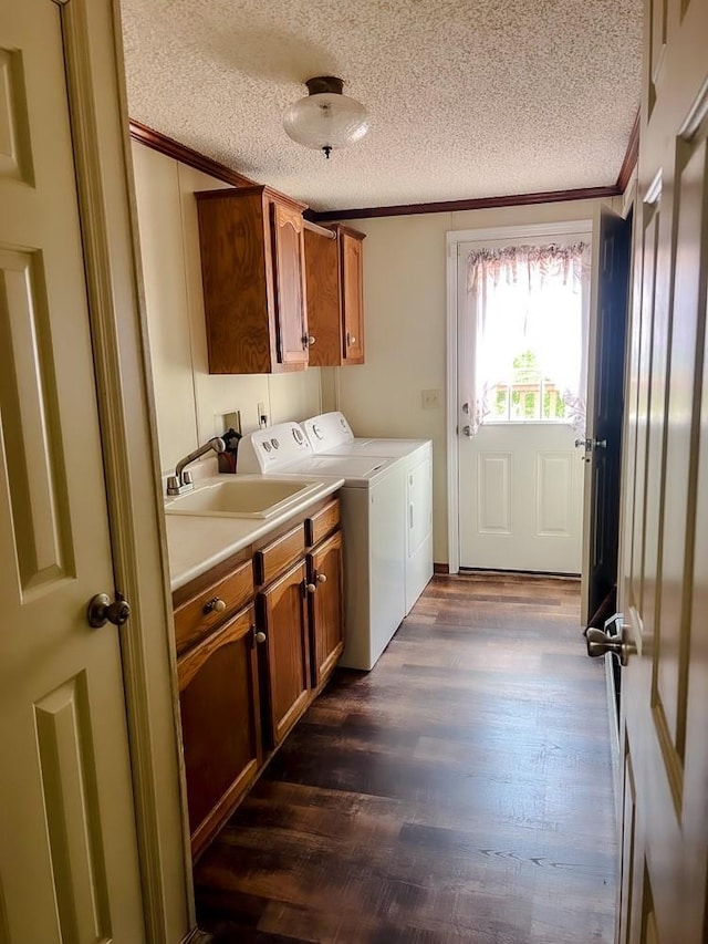 521 Hessinger Lare Rd, Jeffersonville, NY 12748 - laundry room featuring cabinet space, crown molding, separate washer and dryer, a textured ceiling, and dark wood finished floors