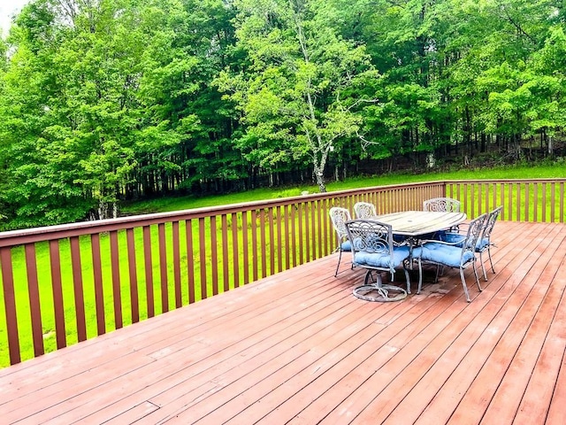 521 Hessinger Lare Rd, Jeffersonville, NY 12748 - wooden deck with outdoor dining space and a lawn