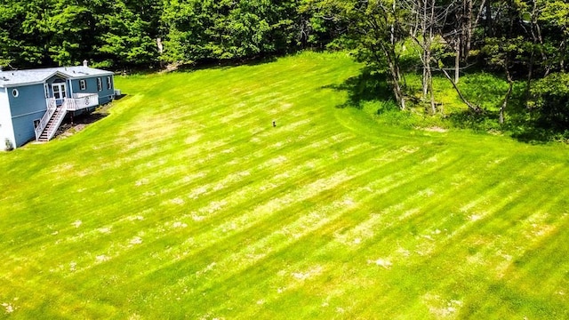 521 Hessinger Lare Rd, Jeffersonville, NY 12748 - view of green lawn with stairs and a deck