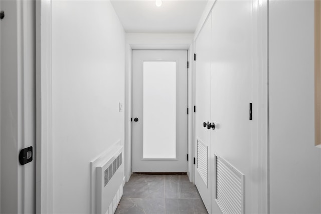 66 S Madison Ave Unit 212, Spring Valley, NY 10977 - hallway with visible vents and radiator heating unit