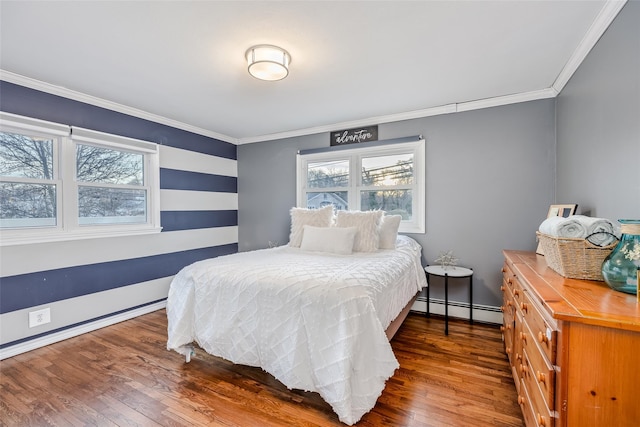 bedroom featuring dark wood-type flooring, multiple windows, a baseboard radiator, and crown molding