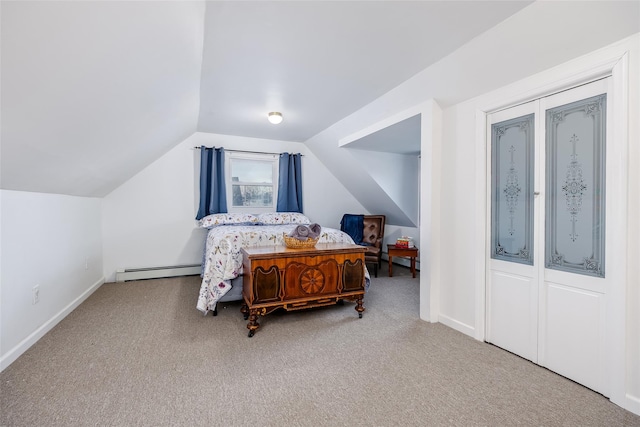 carpeted bedroom featuring baseboards, a baseboard heating unit, and vaulted ceiling