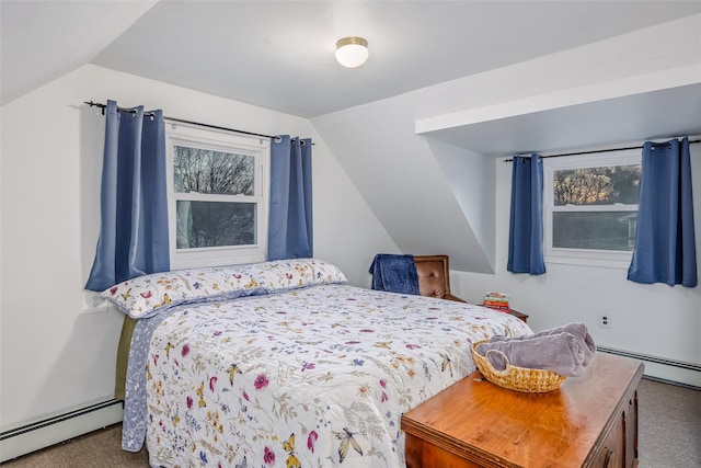 carpeted bedroom with multiple windows, vaulted ceiling, and baseboard heating