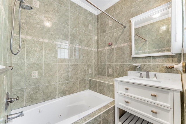 full bathroom with ornamental molding, tile walls, a combined bath / shower with jetted tub, and vanity