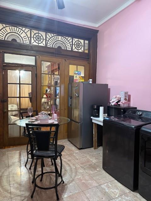 412 W 146th St, New York Manhattan, NY 10031 - dining room featuring ornamental molding and washing machine and dryer