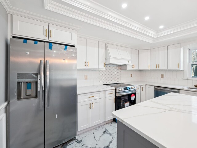 kitchen featuring marble finish floor, custom exhaust hood, stainless steel appliances, backsplash, and ornamental molding