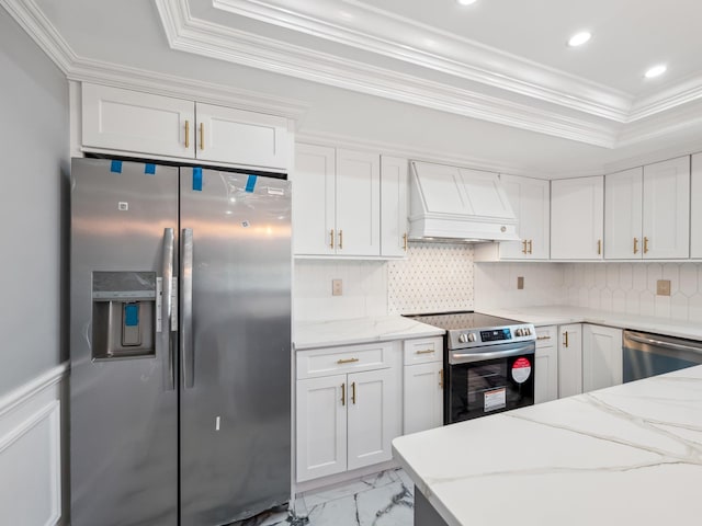 kitchen featuring marble finish floor, custom exhaust hood, decorative backsplash, appliances with stainless steel finishes, and ornamental molding