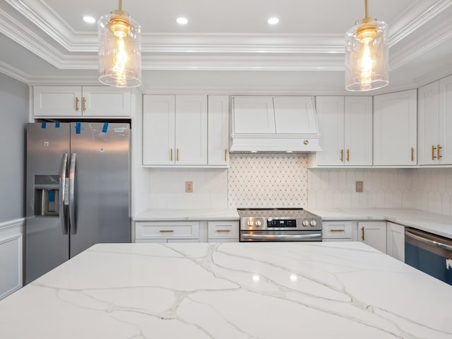 kitchen featuring stainless steel appliances, hanging light fixtures, backsplash, ornamental molding, and premium range hood