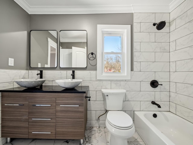 bathroom with marble finish floor, ornamental molding, a sink, and toilet